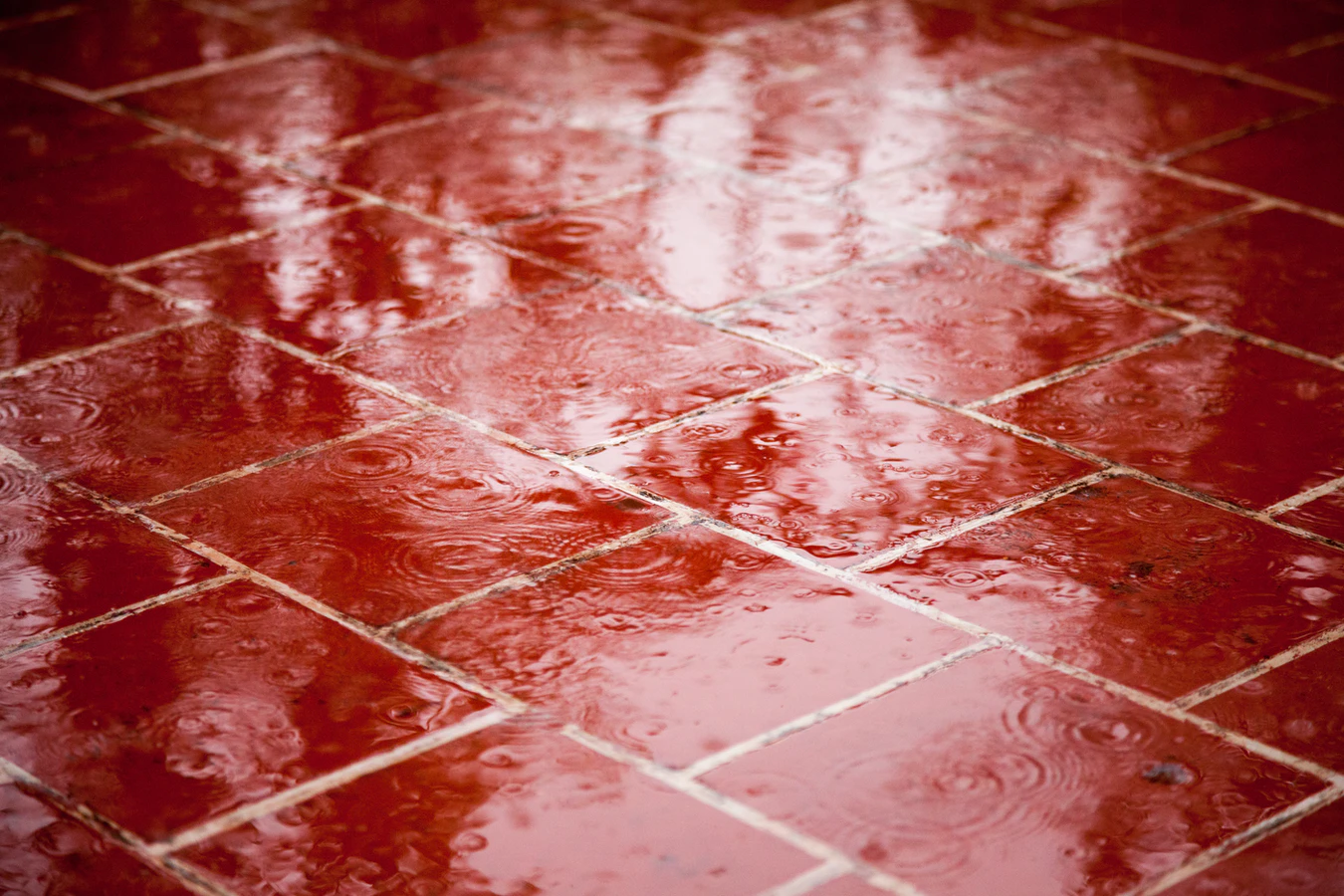 red waterproof tiles wet from being in the rain